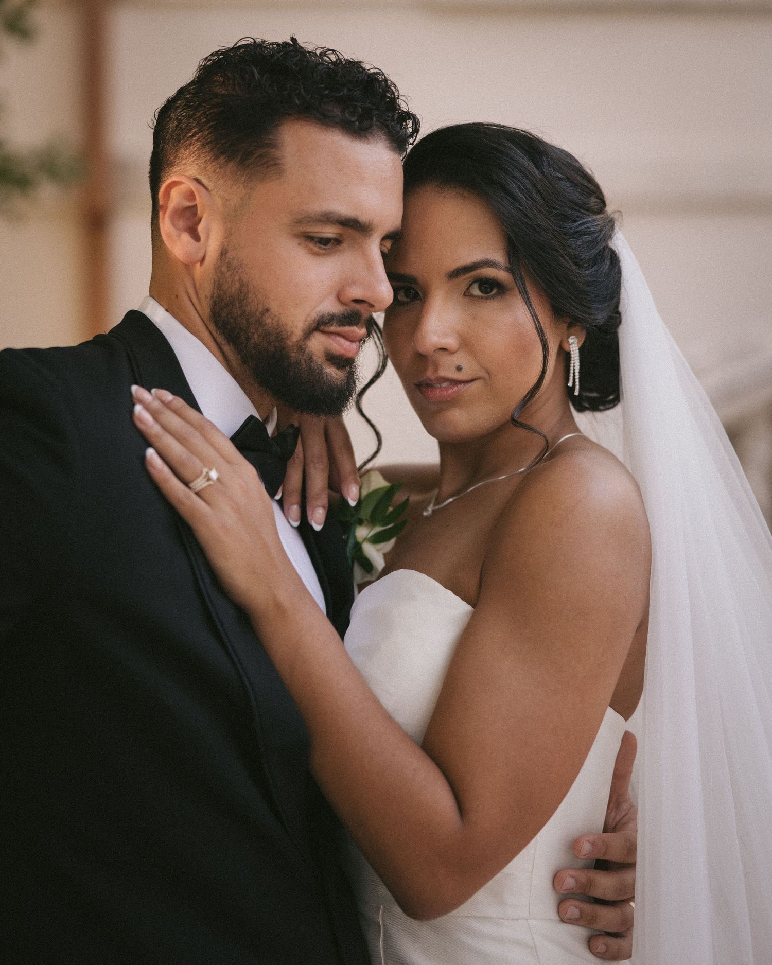 Wedding couple photographed in natural light
Bride and groom embracing during wedding day
Candid moment from a Florida wedding