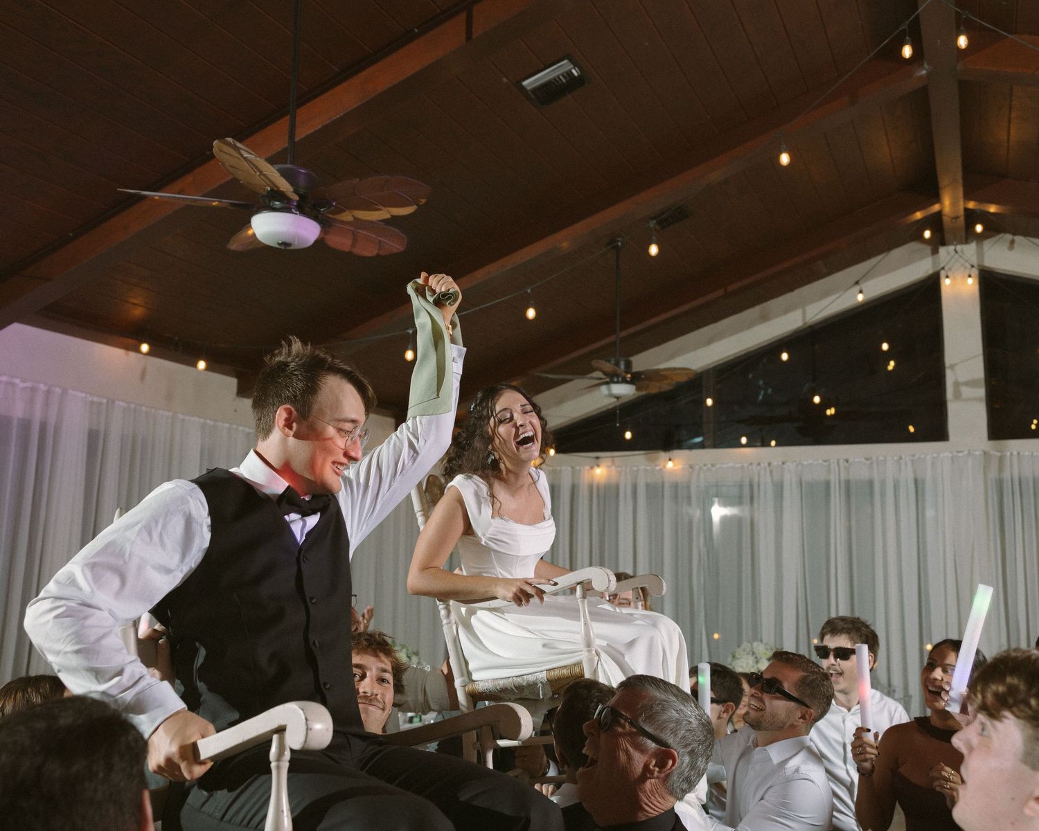 Wedding couple photographed in natural light
Bride and groom embracing during wedding day
Candid moment from a Florida wedding