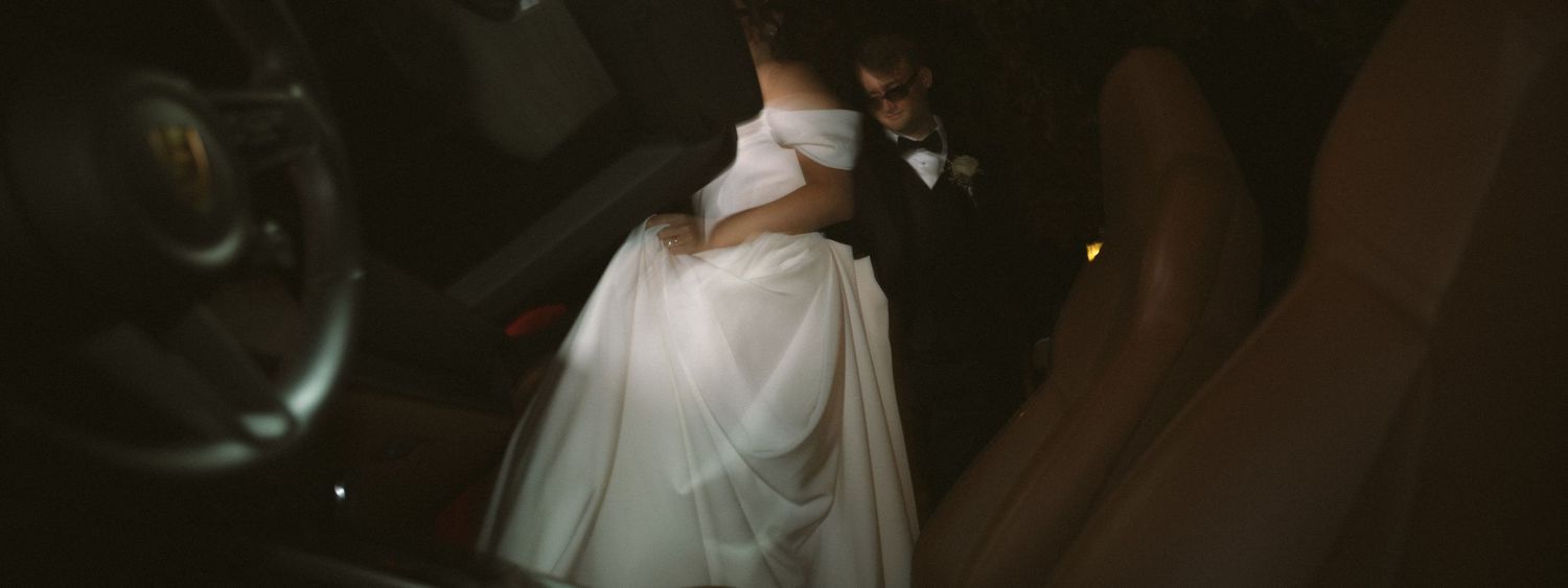 Wedding couple photographed in natural light
Bride and groom embracing during wedding day
Candid moment from a Florida wedding