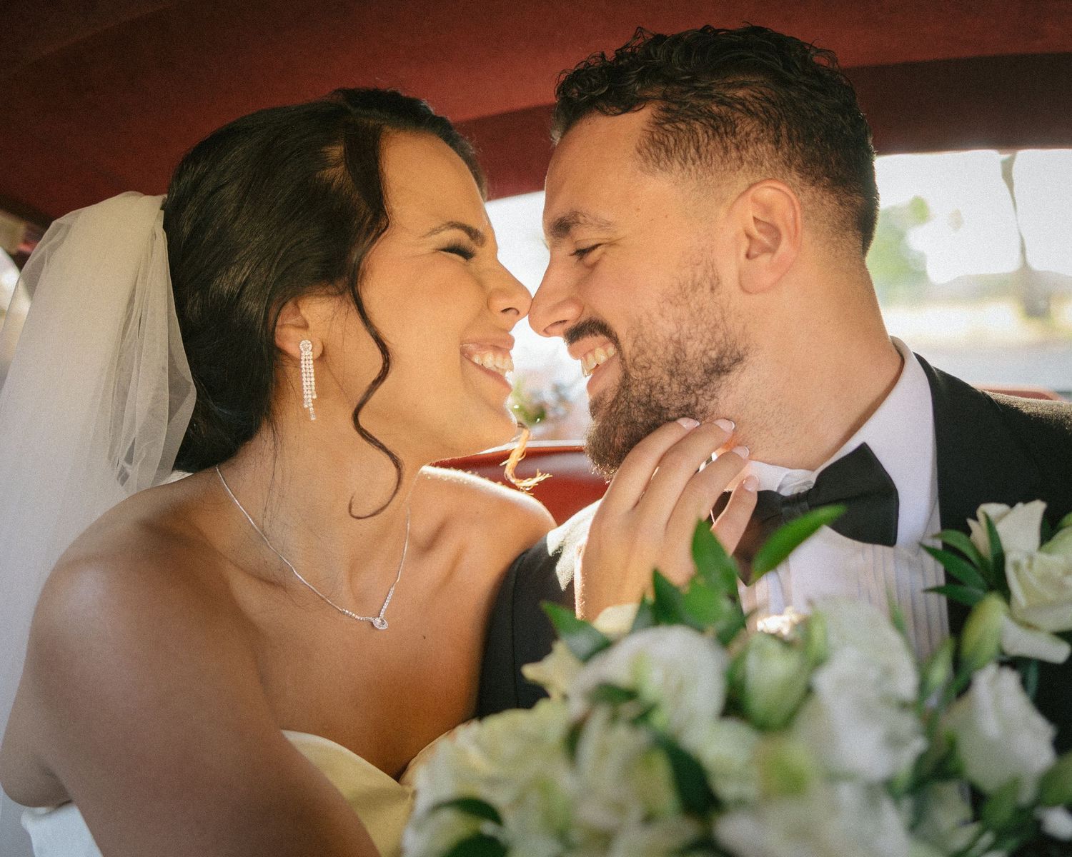 Wedding couple photographed in natural light
Bride and groom embracing during wedding day
Candid moment from a Florida wedding
