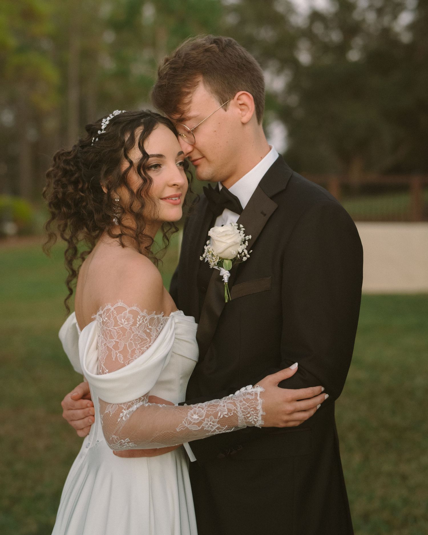 Wedding couple photographed in natural light
Bride and groom embracing during wedding day
Candid moment from a Florida wedding