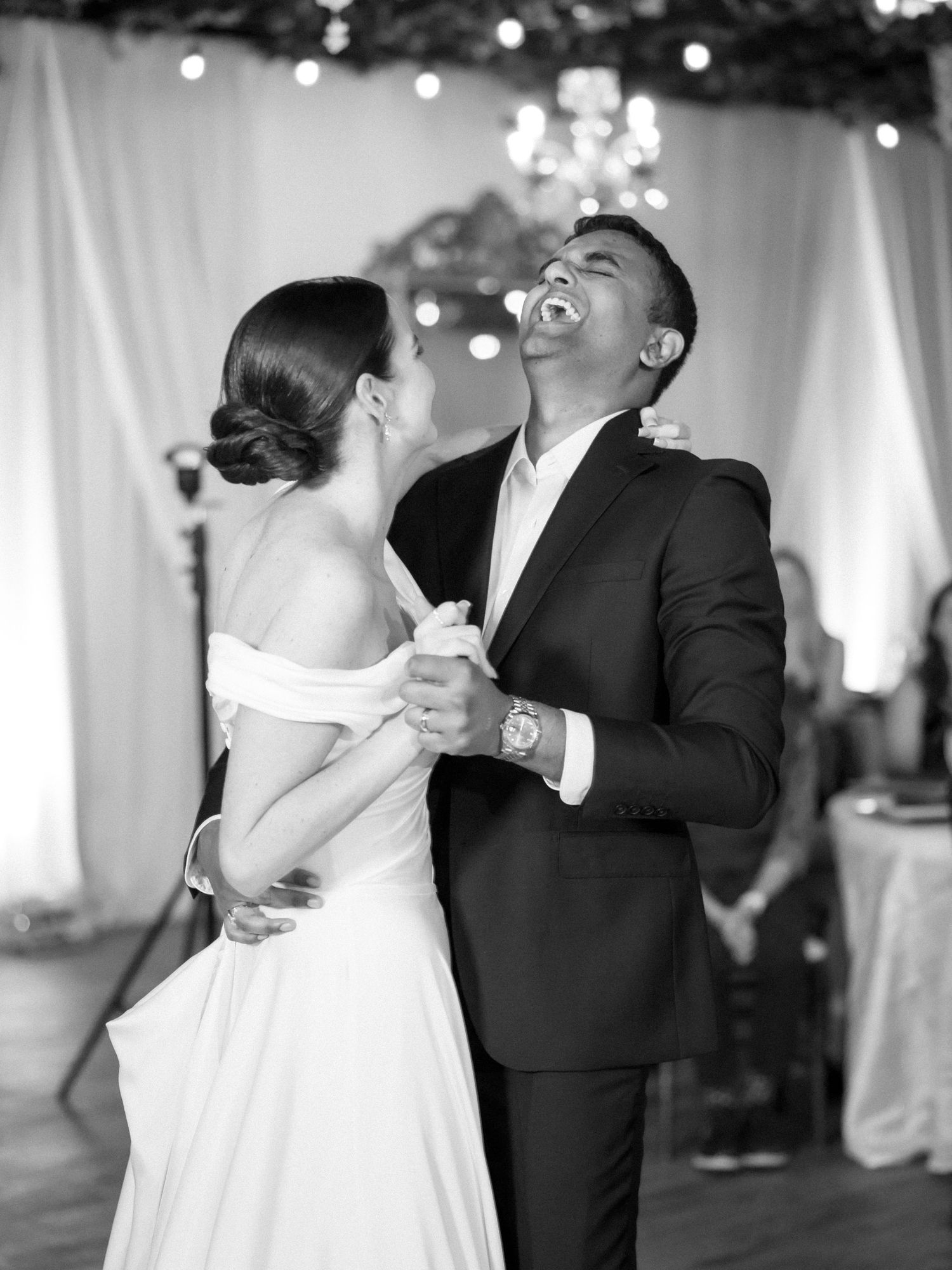 Wedding couple photographed in natural light
Bride and groom embracing during wedding day
Candid moment from a Florida wedding