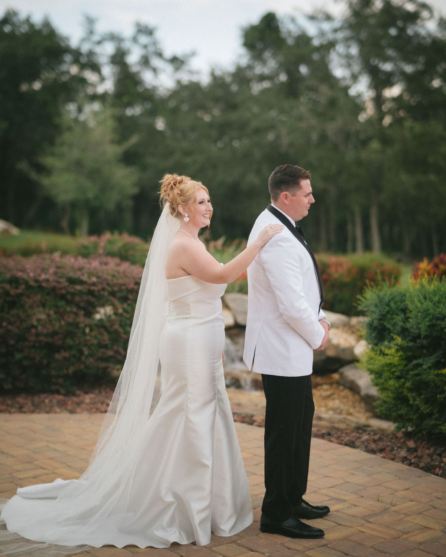 Wedding couple photographed in natural light
Bride and groom embracing during wedding day
Candid moment from a Florida wedding