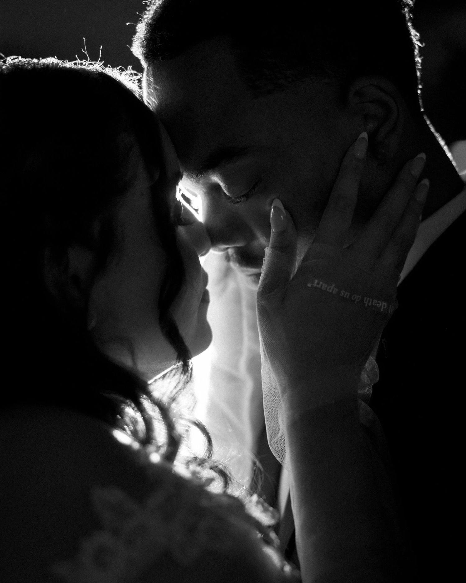 Wedding couple photographed in natural light
Bride and groom embracing during wedding day
Candid moment from a Florida wedding