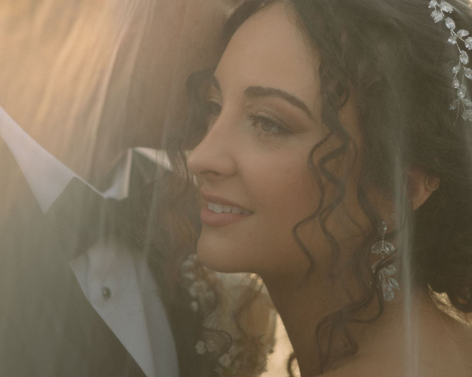 Wedding couple photographed in natural light
Bride and groom embracing during wedding day
Candid moment from a Florida wedding