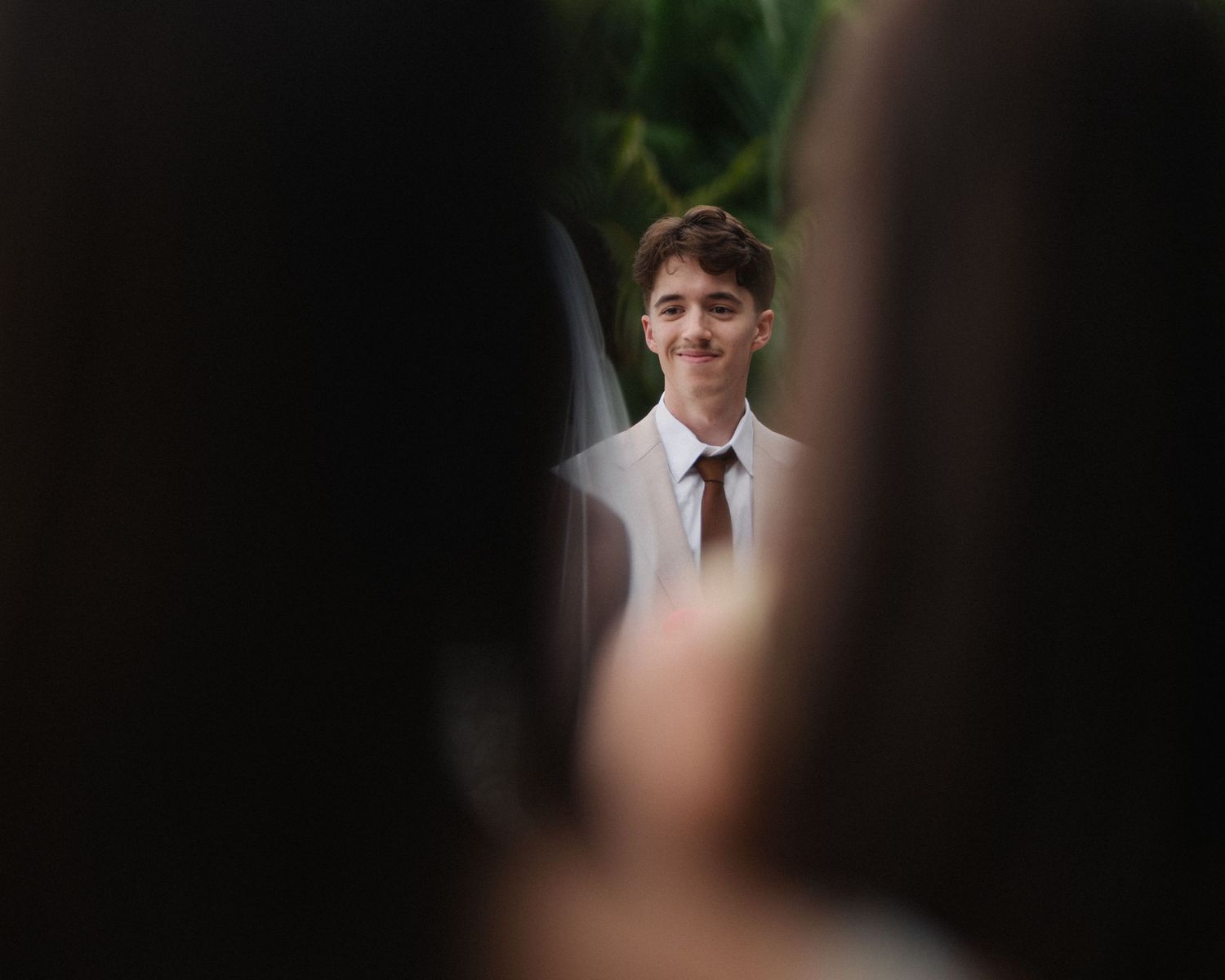 Wedding couple photographed in natural light
Bride and groom embracing during wedding day
Candid moment from a Florida wedding