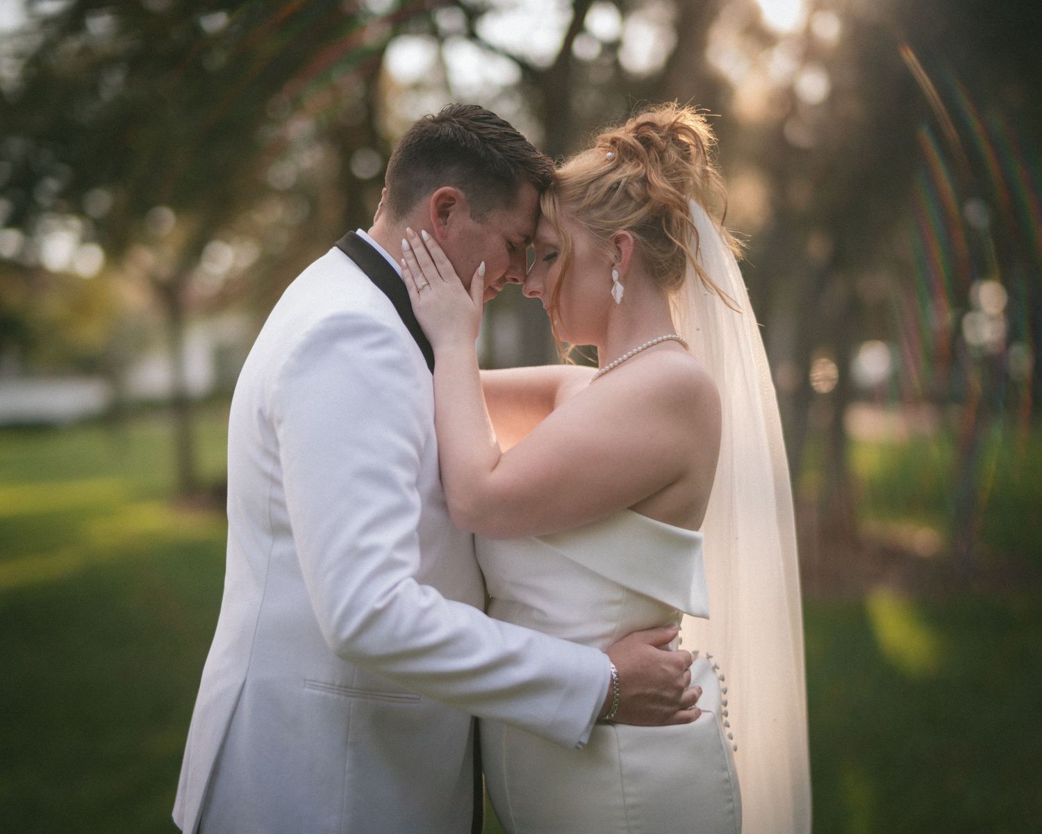 Wedding couple photographed in natural light
Bride and groom embracing during wedding day
Candid moment from a Florida wedding