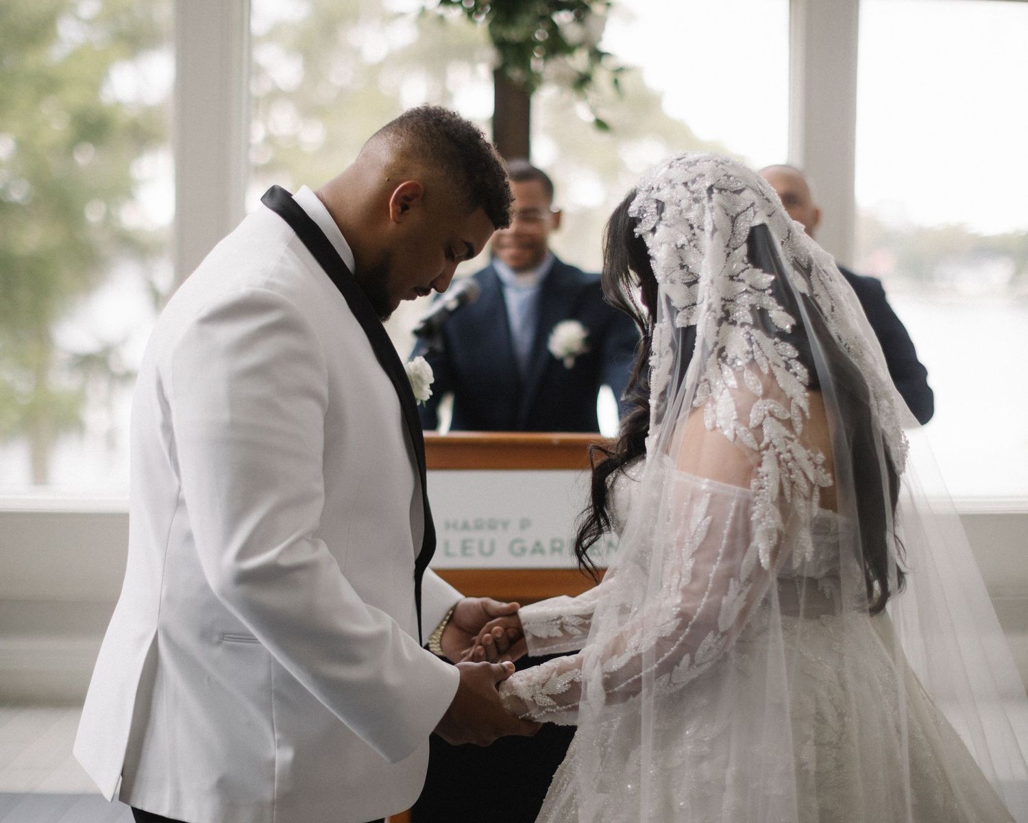 Wedding couple photographed in natural light
Bride and groom embracing during wedding day
Candid moment from a Florida wedding