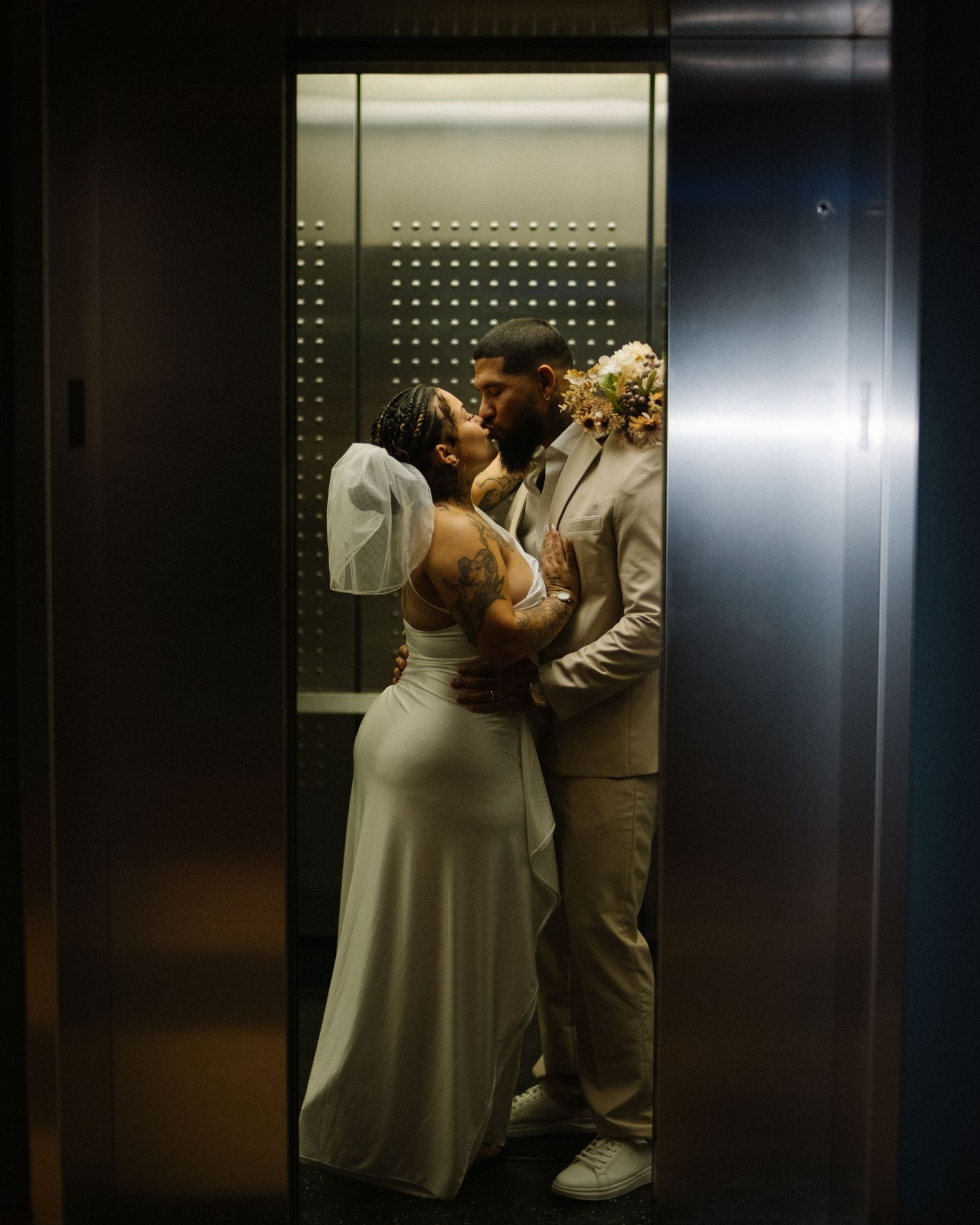 Wedding couple photographed in natural light
Bride and groom embracing during wedding day
Candid moment from a Florida wedding