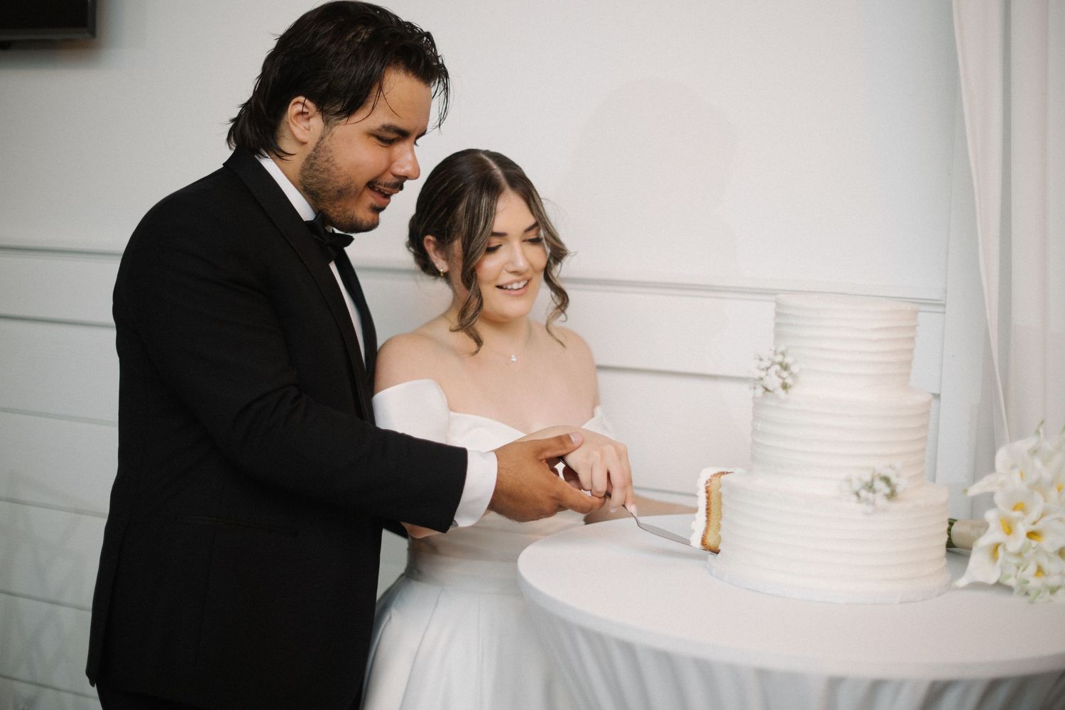 Wedding couple photographed in natural light
Bride and groom embracing during wedding day
Candid moment from a Florida wedding