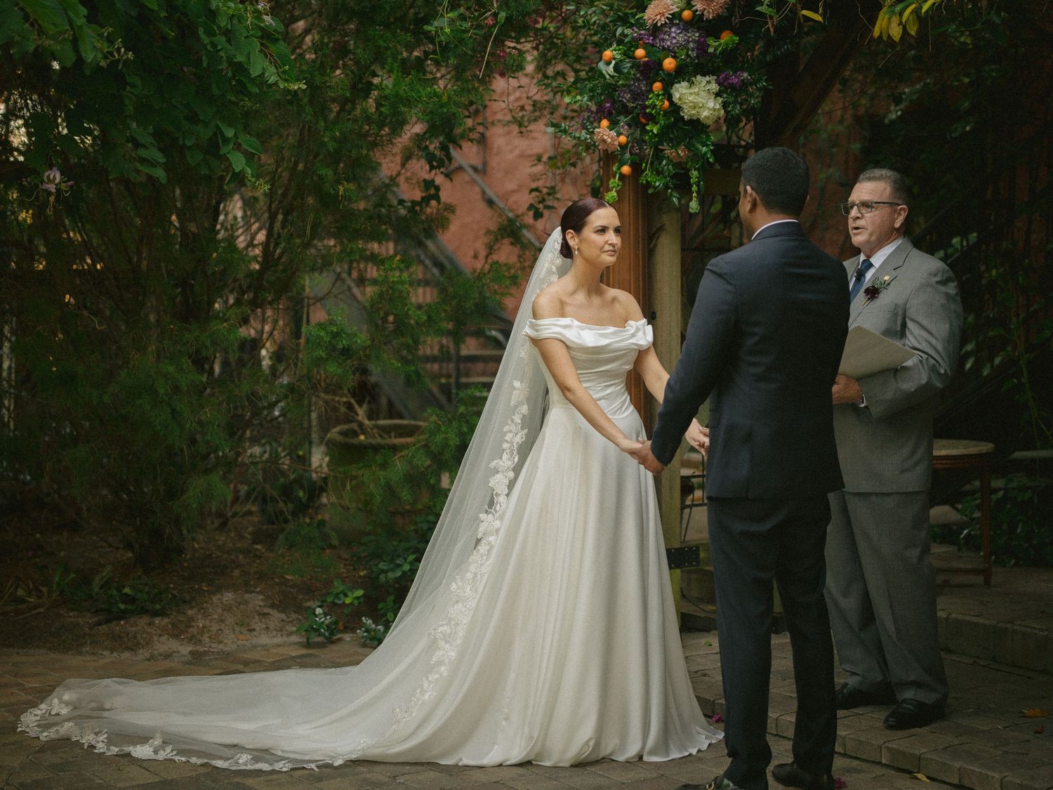 Wedding couple photographed in natural light
Bride and groom embracing during wedding day
Candid moment from a Florida wedding