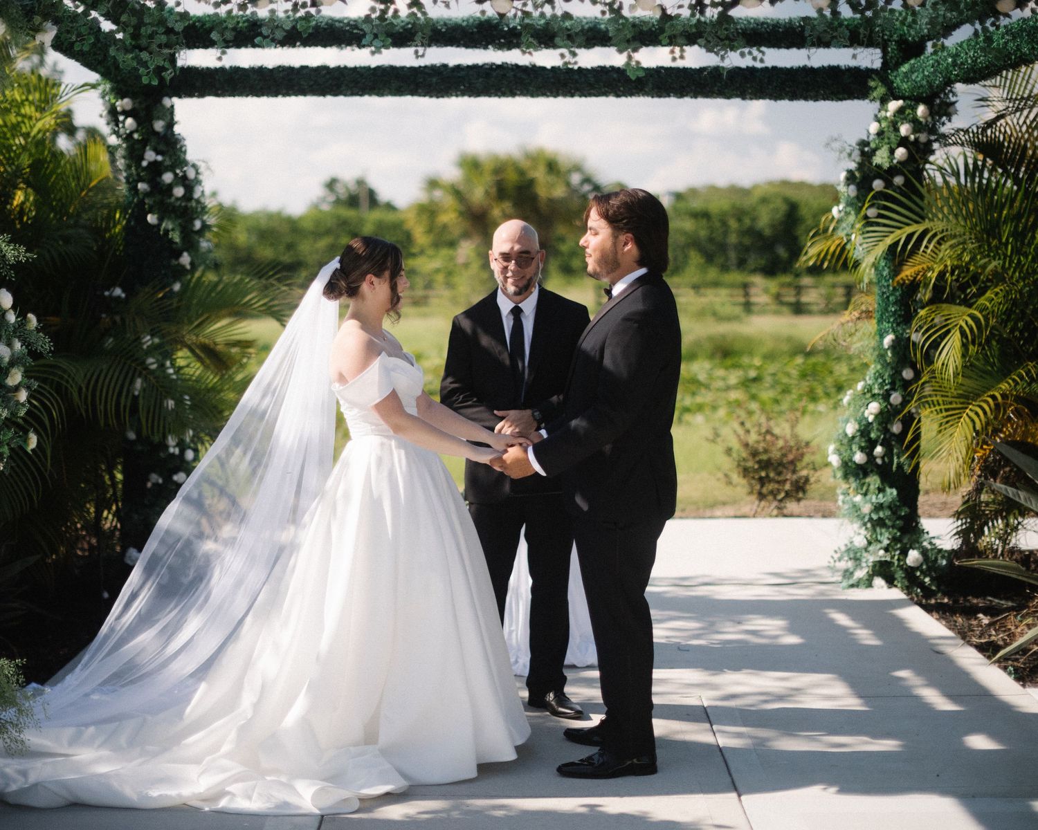 Wedding couple photographed in natural light
Bride and groom embracing during wedding day
Candid moment from a Florida wedding