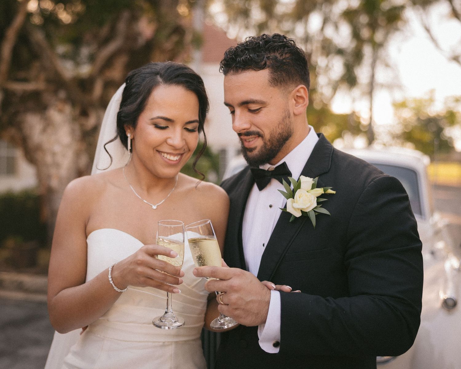 Wedding couple photographed in natural light
Bride and groom embracing during wedding day
Candid moment from a Florida wedding