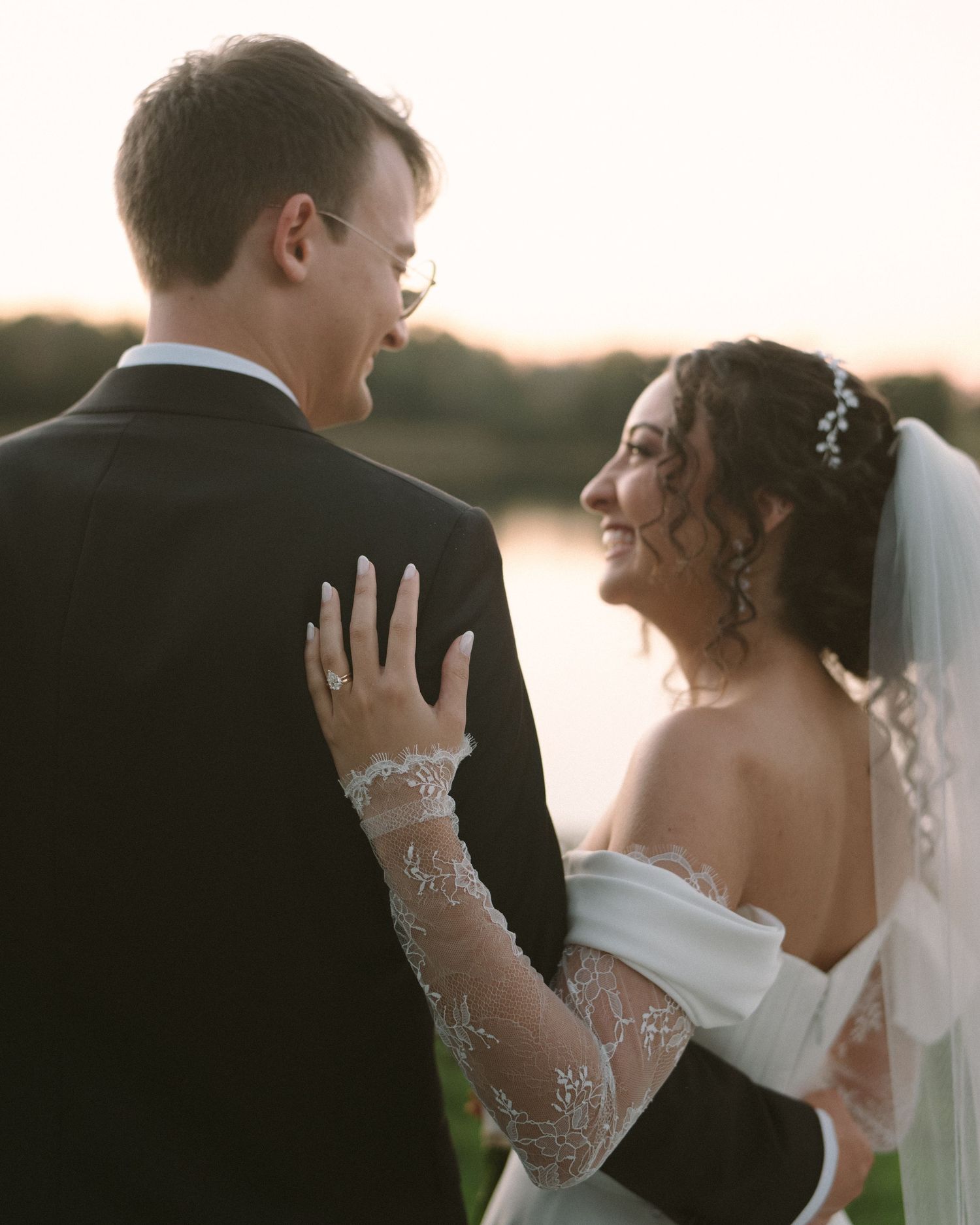 Wedding couple photographed in natural light
Bride and groom embracing during wedding day
Candid moment from a Florida wedding