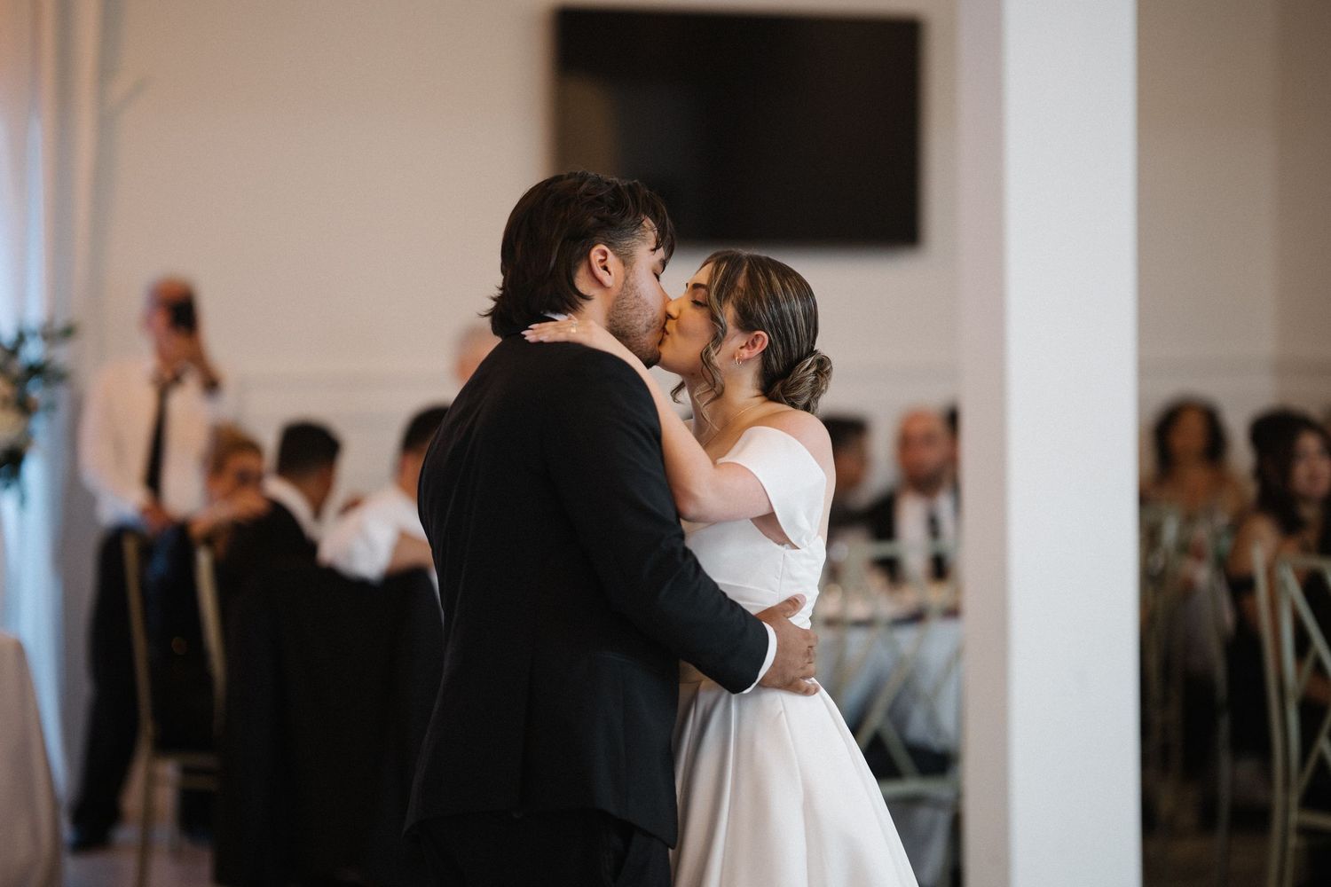 Wedding couple photographed in natural light
Bride and groom embracing during wedding day
Candid moment from a Florida wedding