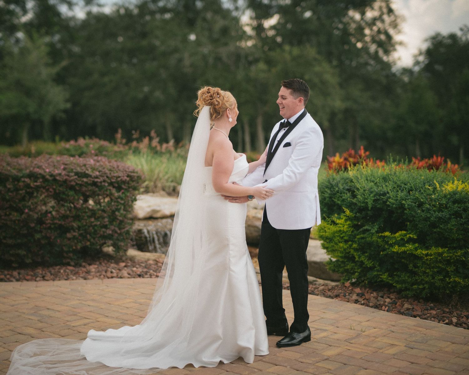 Wedding couple photographed in natural light
Bride and groom embracing during wedding day
Candid moment from a Florida wedding