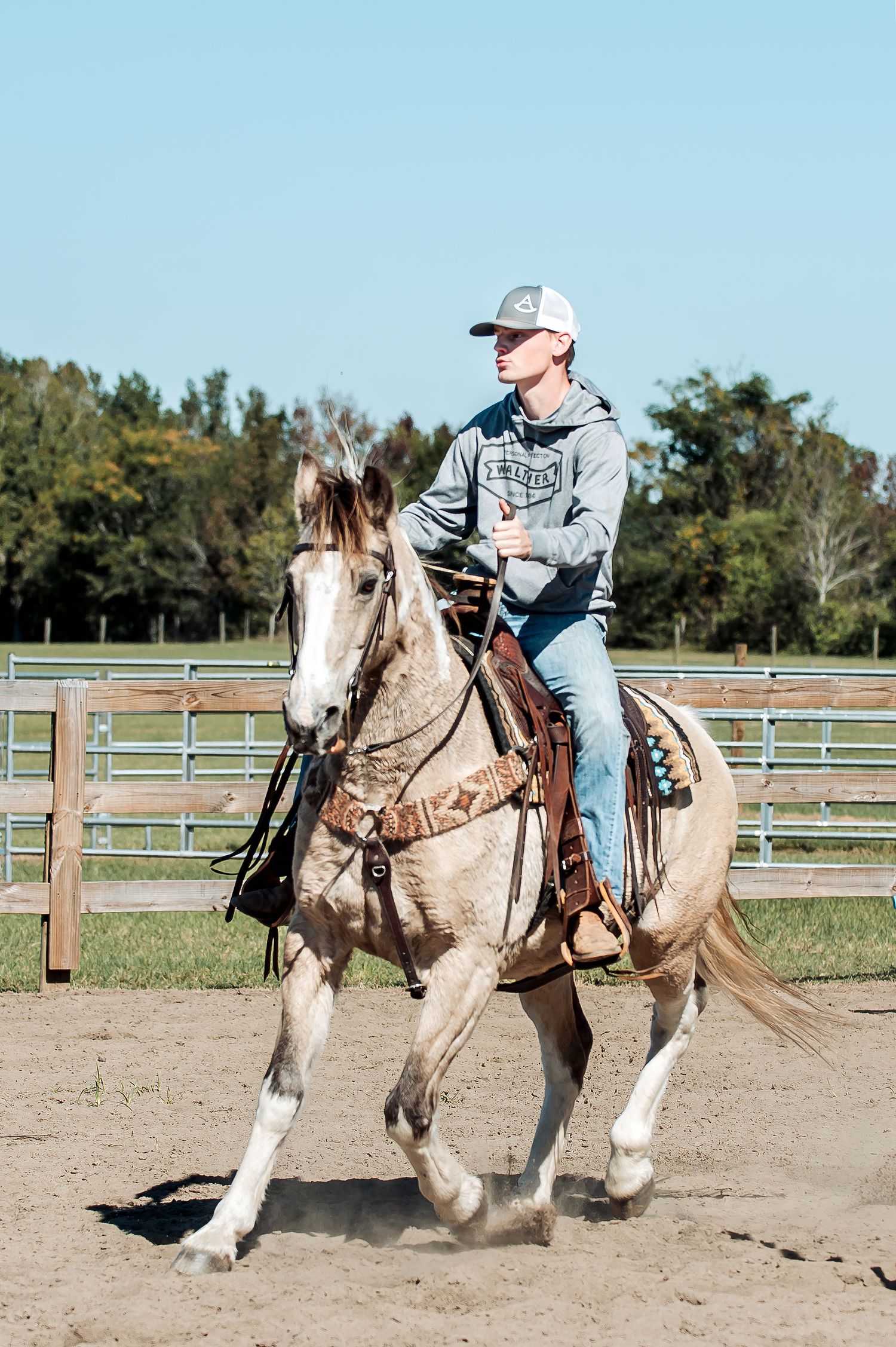 Western rider on a buckskin horse at Adams Family Fun Day in Warrenton, GA, photographed by Lace Cactus Photography.