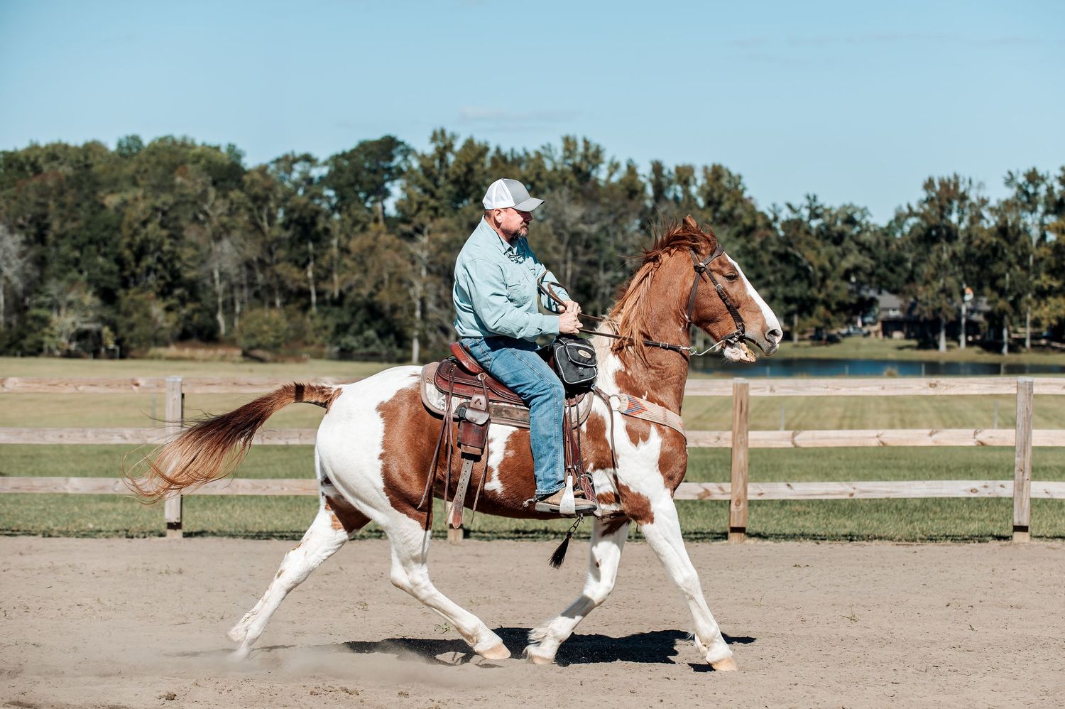 Western rider on a brown-and-white paint horse during Adams Family Fun Day in Warrenton, GA.