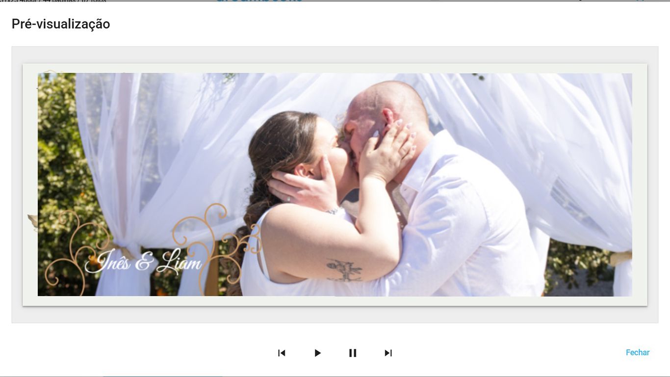 A tender romantic moment captured under a white draped canopy outdoors on a sunny day.