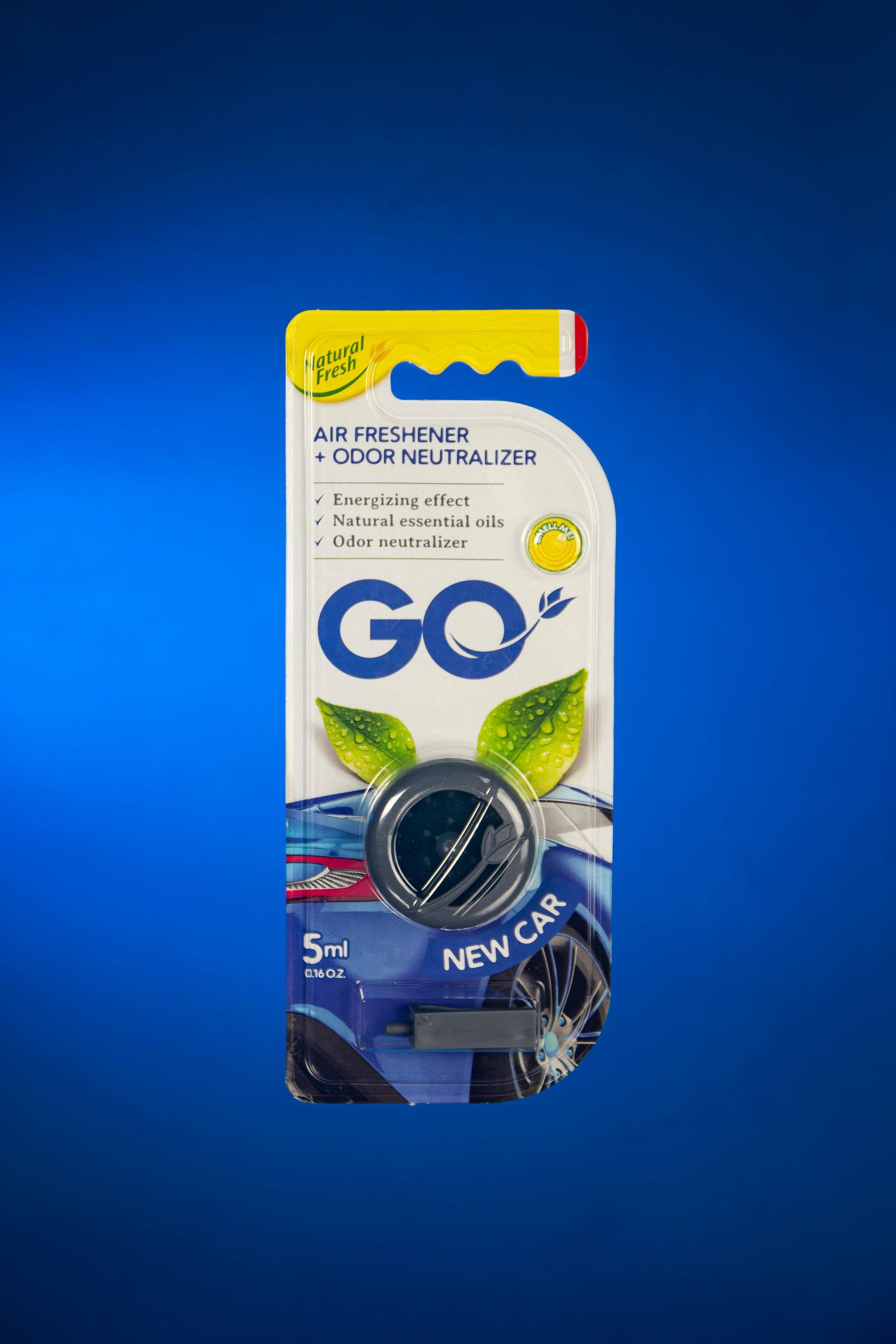 GO air freshener and odor neutralizer in New Car scent, 5ml, displayed in packaging on blue background.