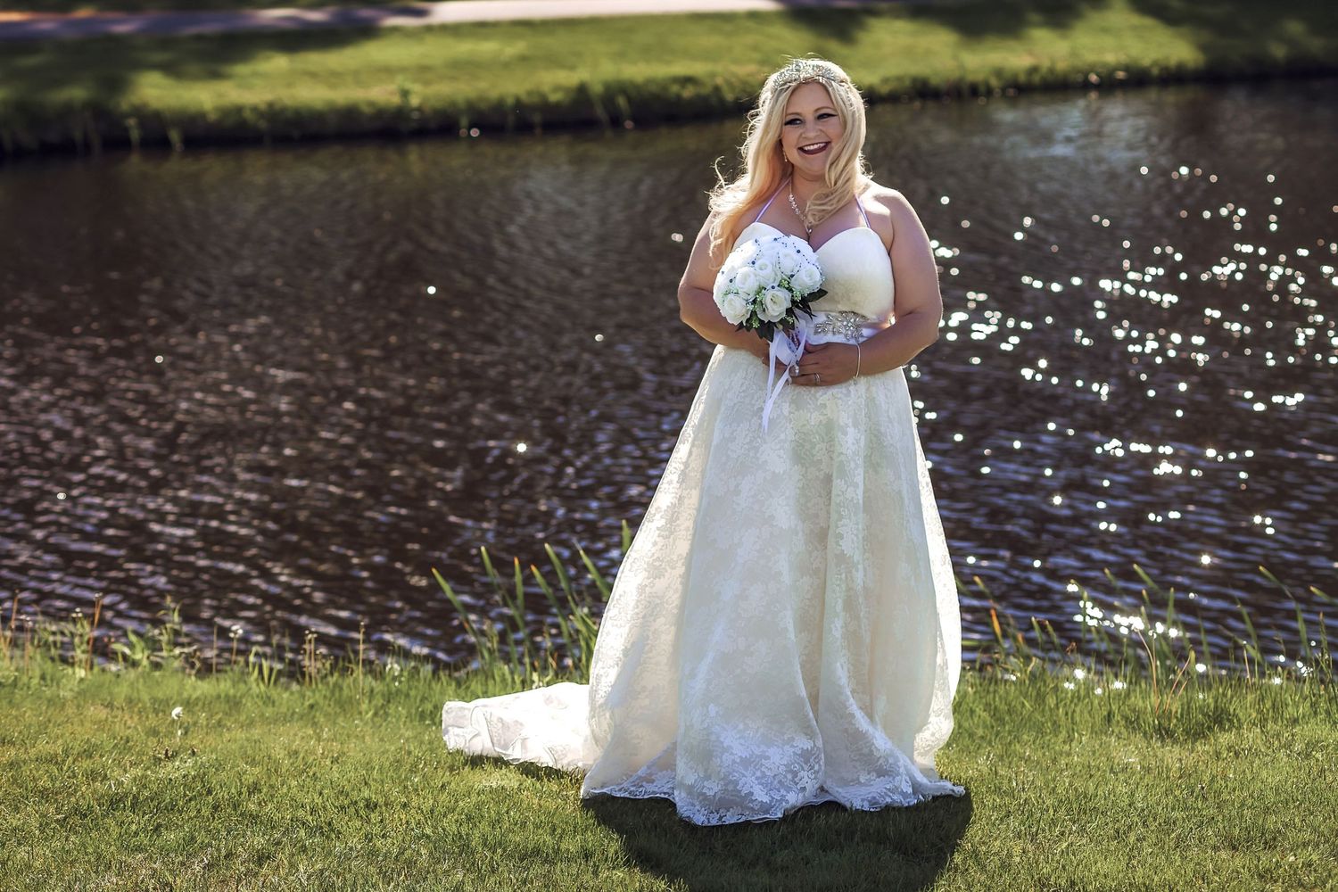 Bride holding bouquet with ocean backdrop in Halifax