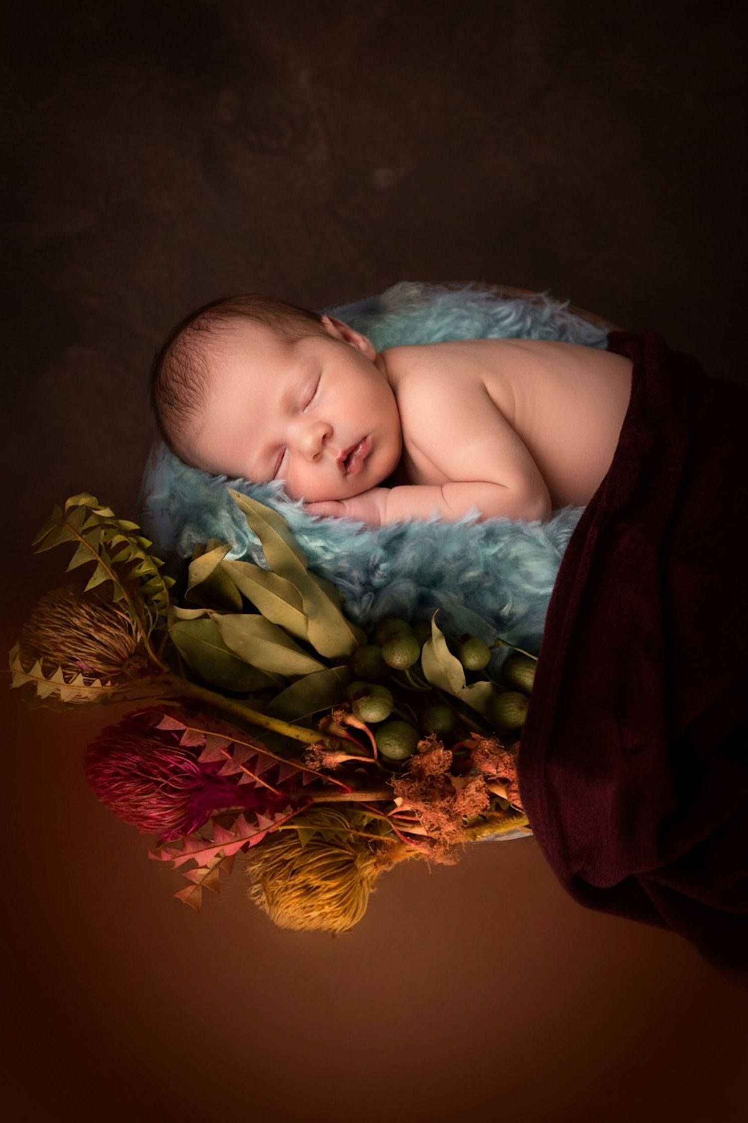 Newborn baby boy in floral setup by Atlantic Memories Photography, South Shore Nova Scotia newborn photographer