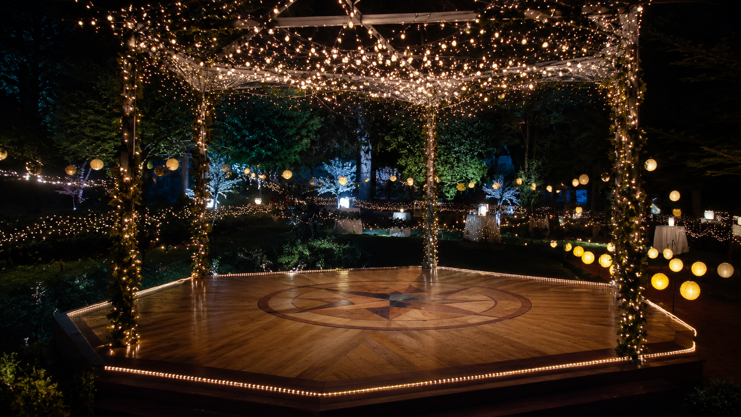 in Halifax, Romantic outdoor gazebo with warm string lights and glowing lanterns on a wooden dance floor at night ready for senior prom