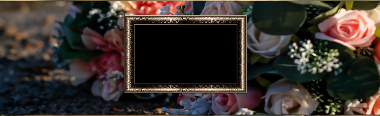 Atlantic memories Elegant gold-framed photo display surrounded by colorful pink and white floral arrangement for a memorial or wedding.
