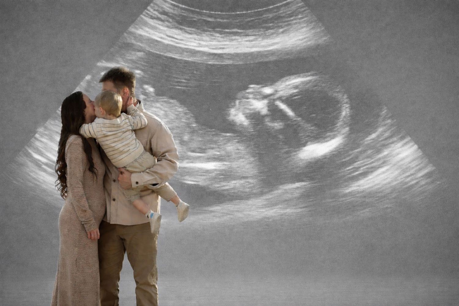 Family couple kissing toddler with ultrasound scan projected in background, pregnancy announcement photo.