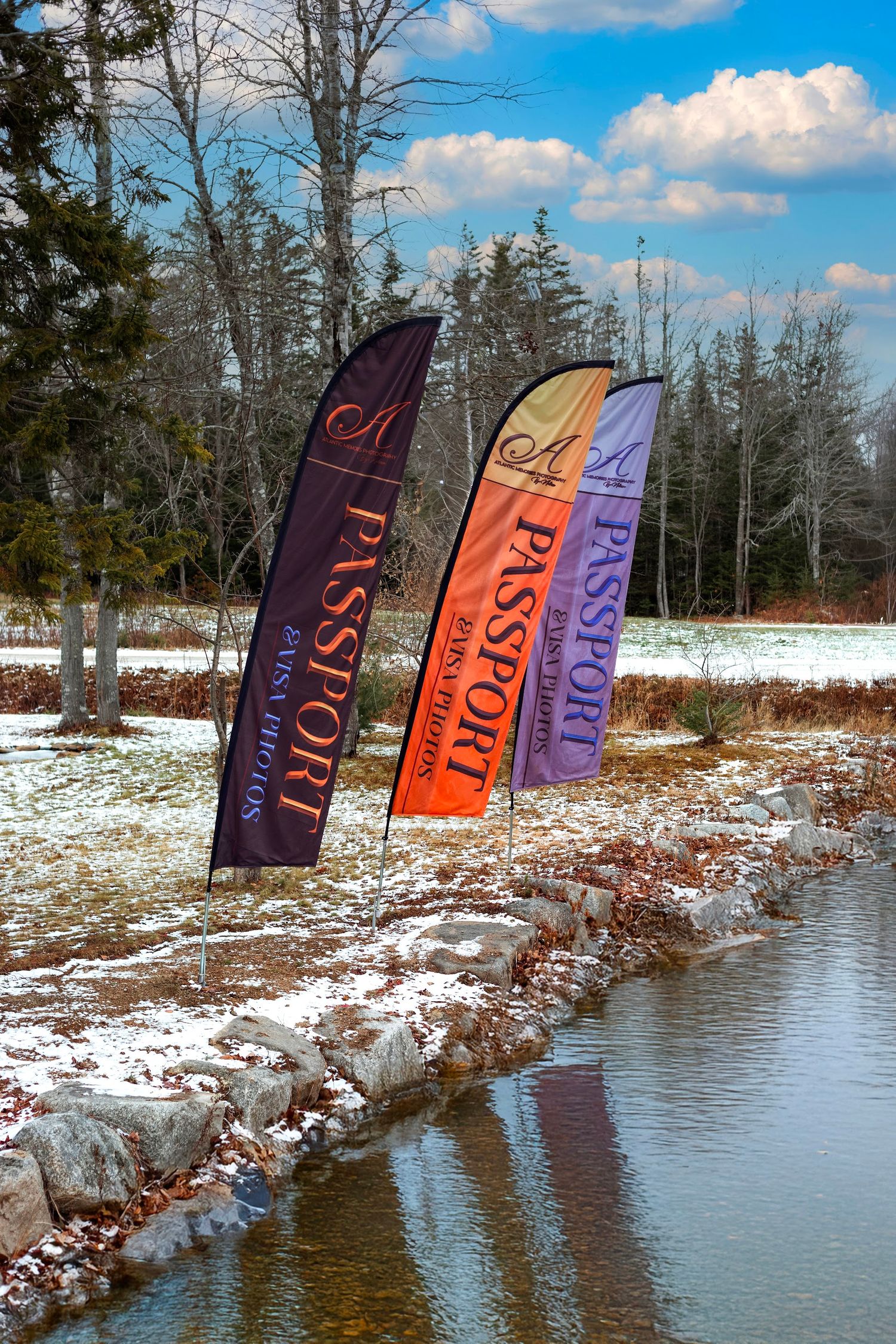 “Passport photo services in Hubbards Nova Scotia by Atlantic Memories Photography with outdoor signage near waterfront