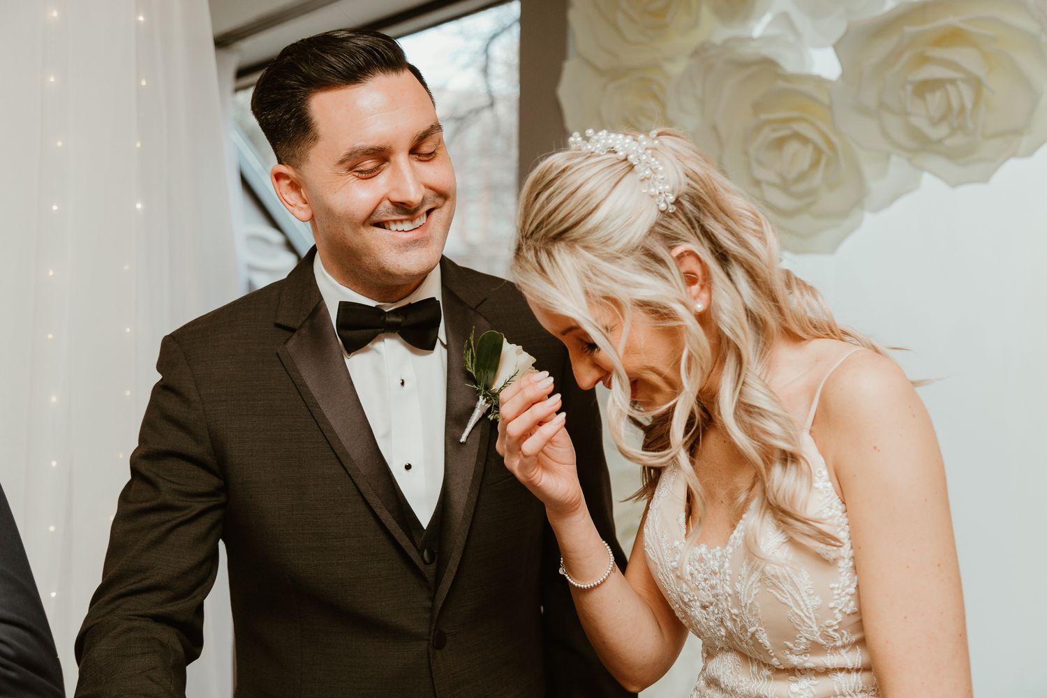 A happy couple shares an intimate moment together during their wedding celebration.