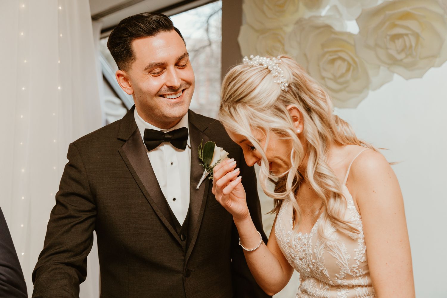 A couple shares an intimate moment together during their wedding celebration.
