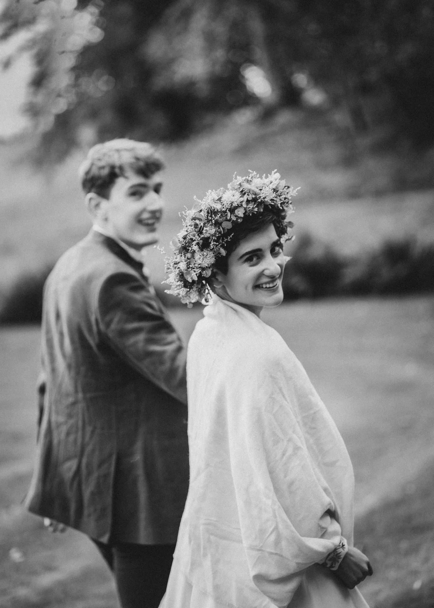 Wedding Photographer in the Lake District- autumn wedding bride looking over her shoulder
