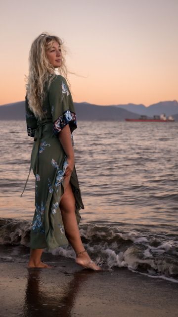 Woman in dark dress at waterfront at sunrise, portrait photography, Locarno beach Vancouver