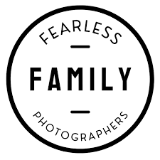 Circular black and white logo design for Fearless Family Photographers with text.