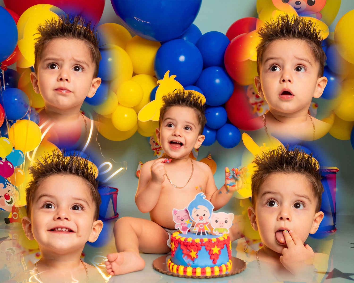 Birthday cake smash photography setup with blue and yellow balloon backdrop.