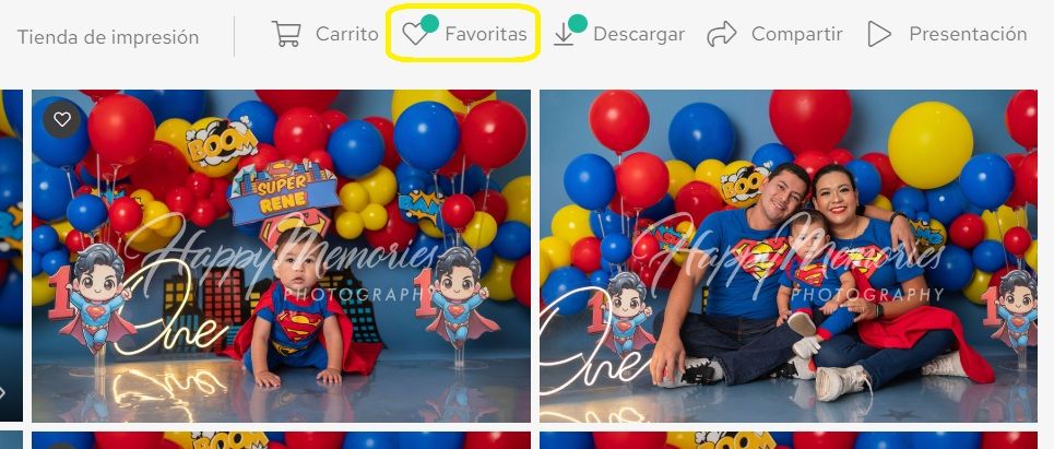 Festive party setup with red and blue balloons against a backdrop featuring cartoon characters and decorations.