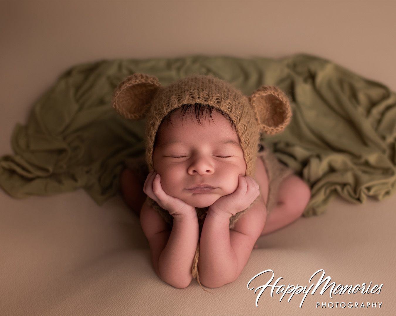 Professional newborn photo series showing sleeping baby in natural posed positions.