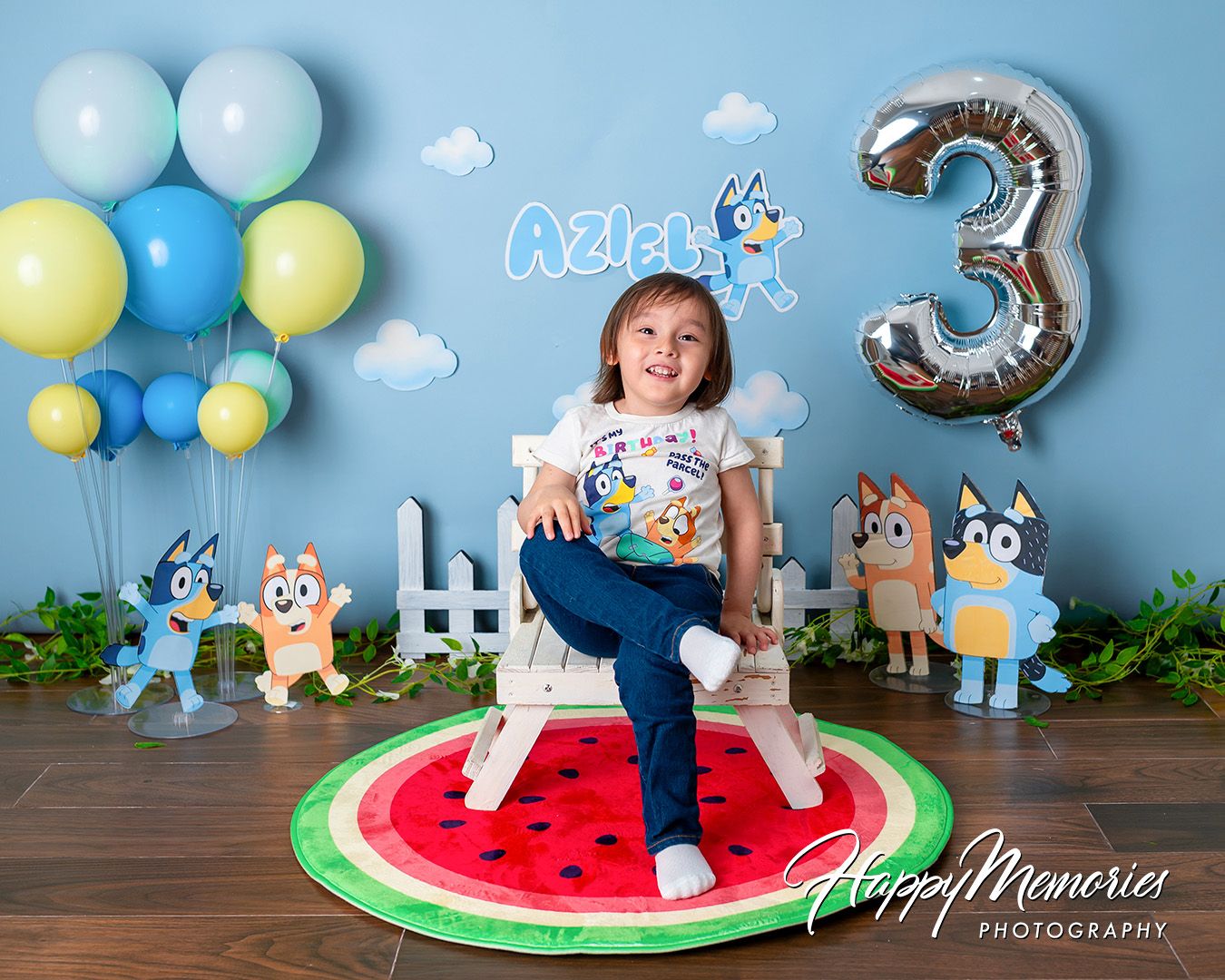 Collage of birthday party scenes with balloon decorations, watermelon rug, and blue backdrop setup for photos.