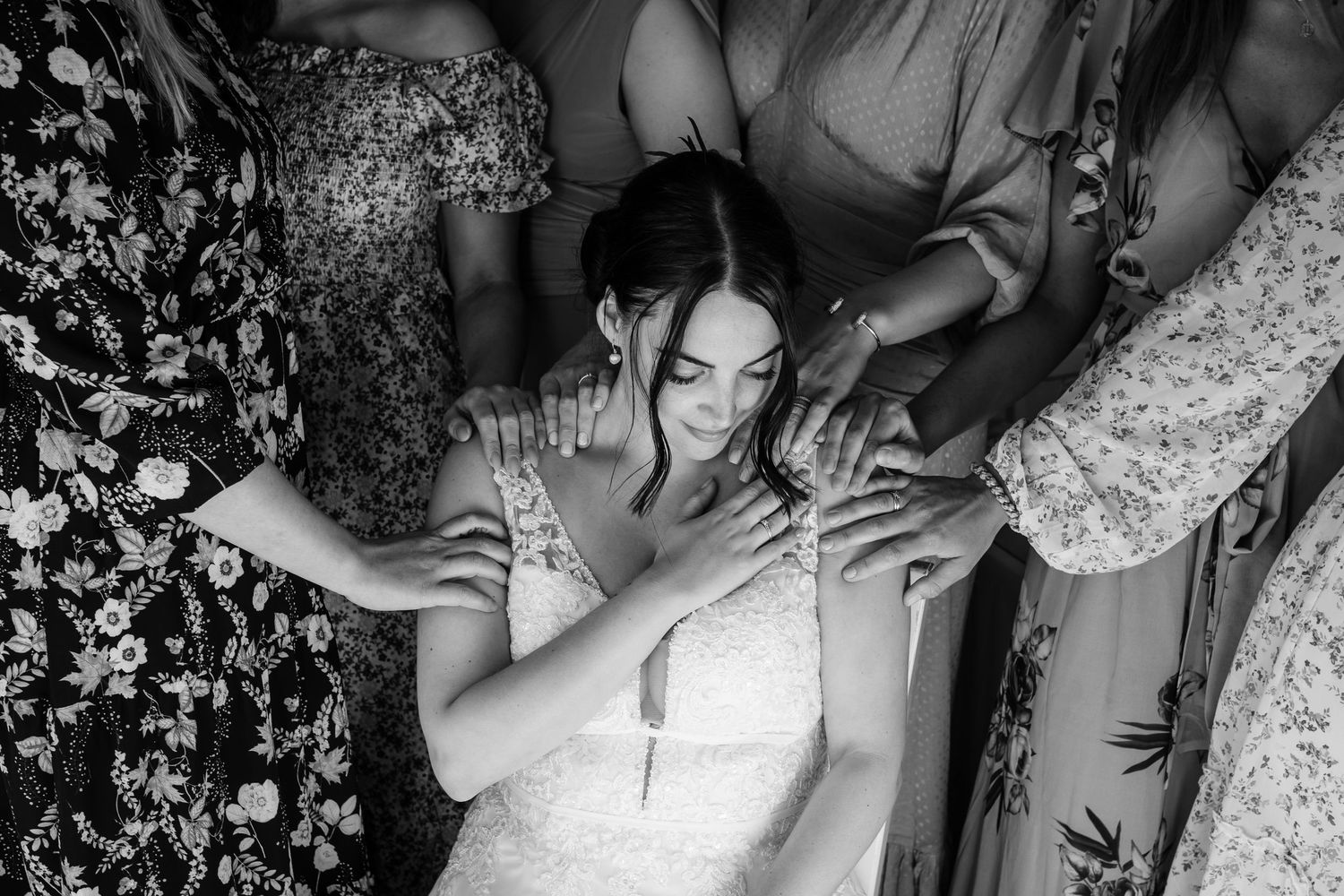 Artistic black and white wedding photography series showing emotional moments.