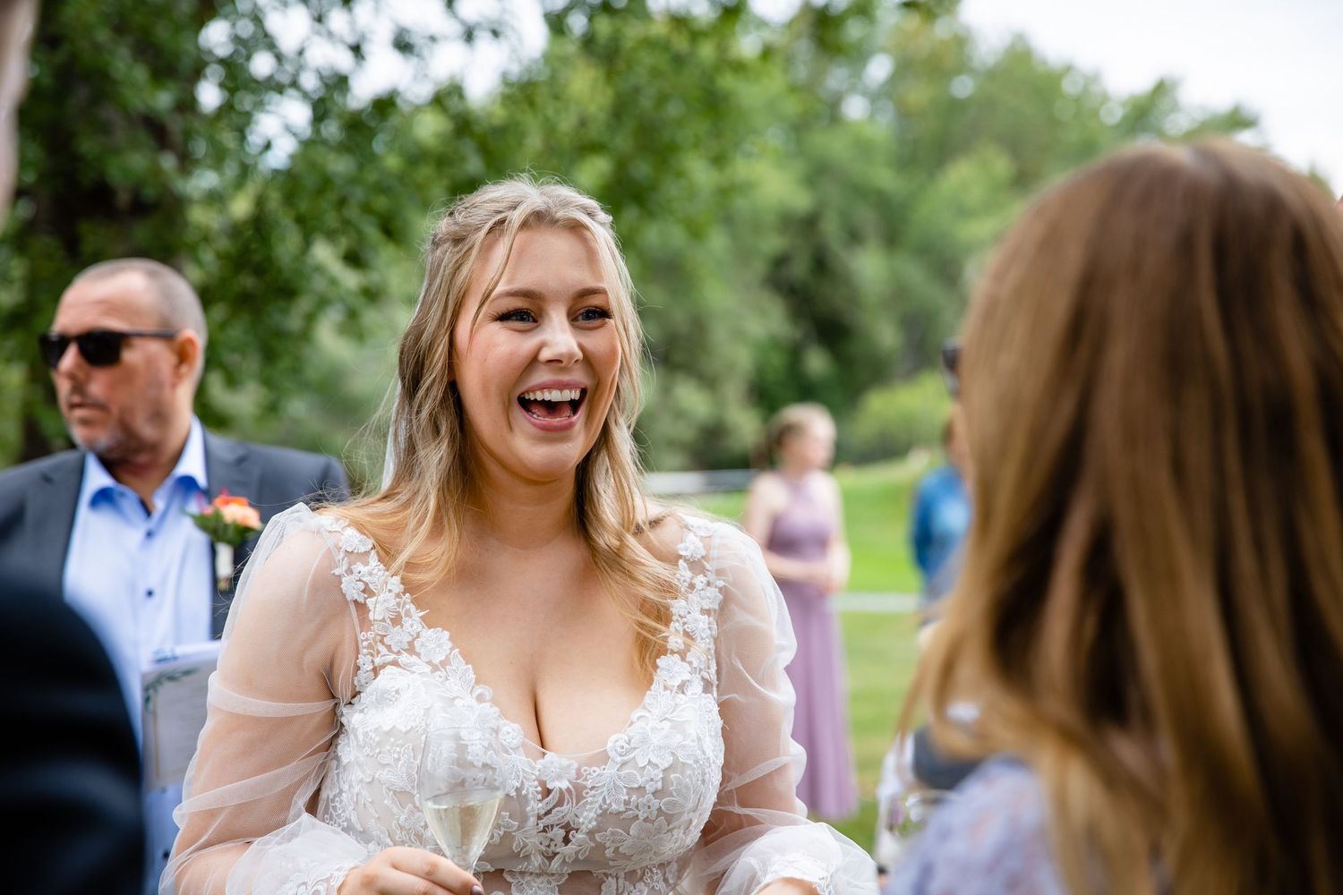 Joyful wedding celebration moments captured in outdoor garden setting.
