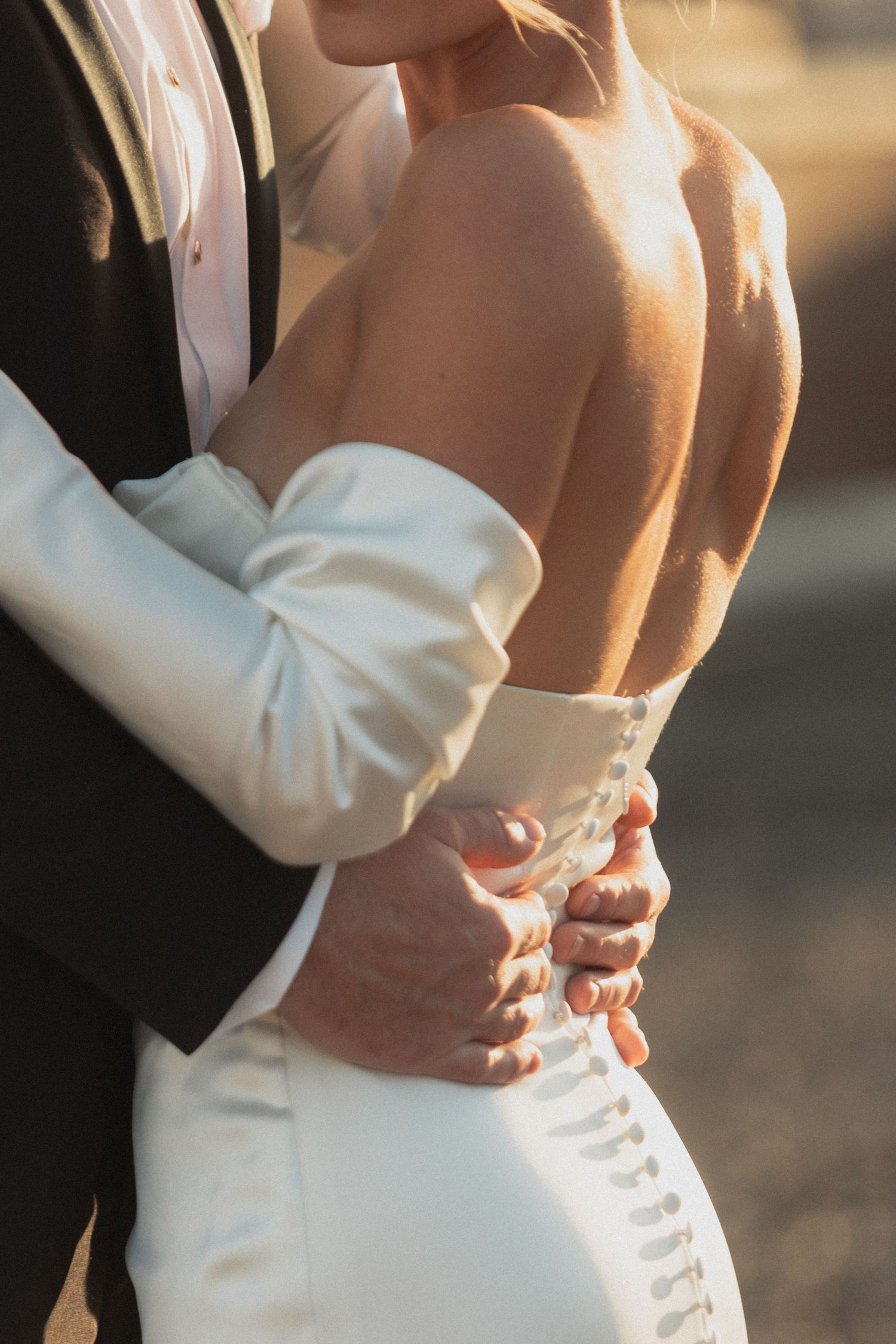 Close-up of a white wedding dress showing intricate back details and buttons at Le Venere Saint Paul Minnesota twincities