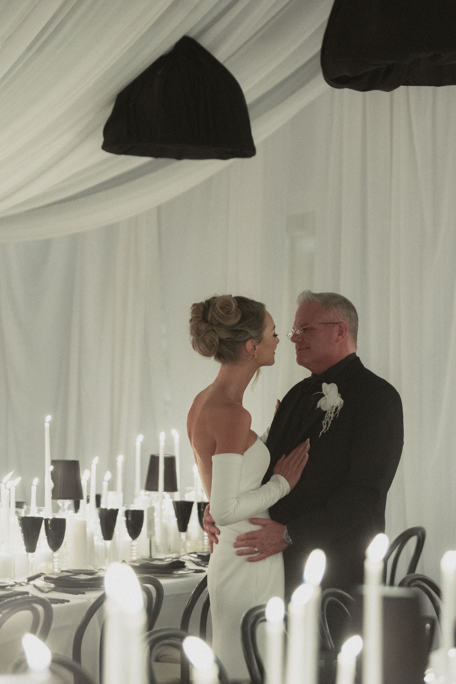 Elegant wedding reception setup with white draping and formal table settings at Aster Cafe Saint Anthony Main Minneapolis Minnesota