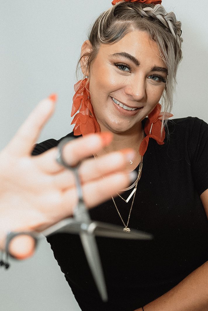 A series of close-up shots showing expressive hand gestures against a light background. branding pictures for hairstylist