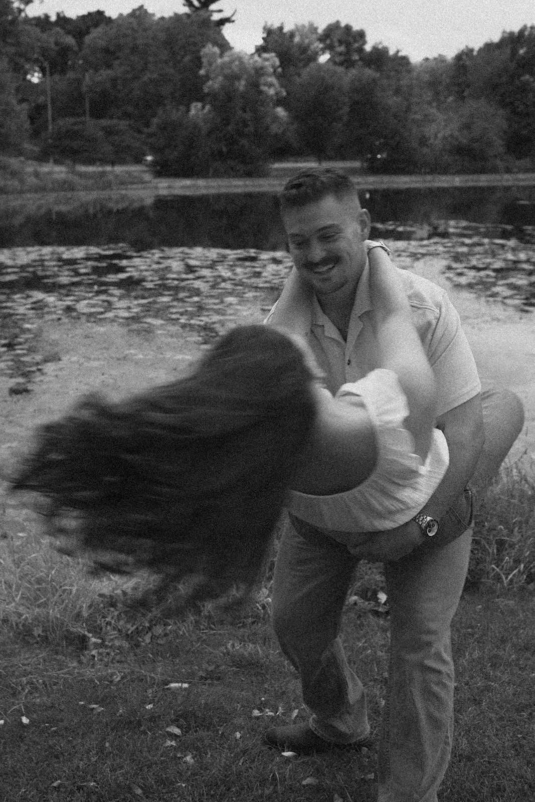 Black and white sequence of hair flipping motion against a pond background intentional motion blur Madison Wisconisin