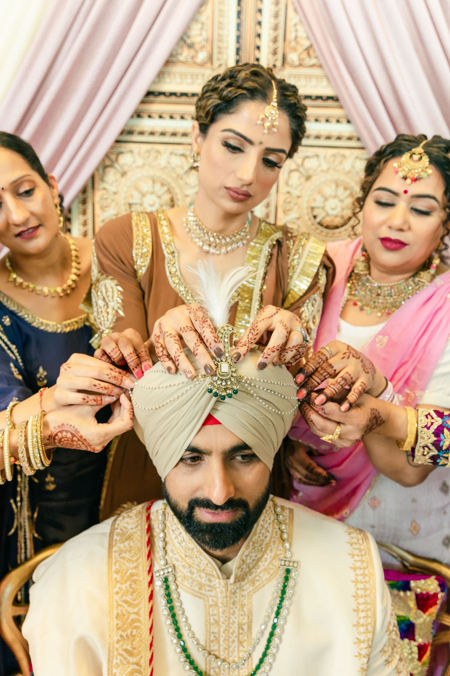 Traditional Indian wedding ceremony showing detailed cultural rituals and decorative attire.