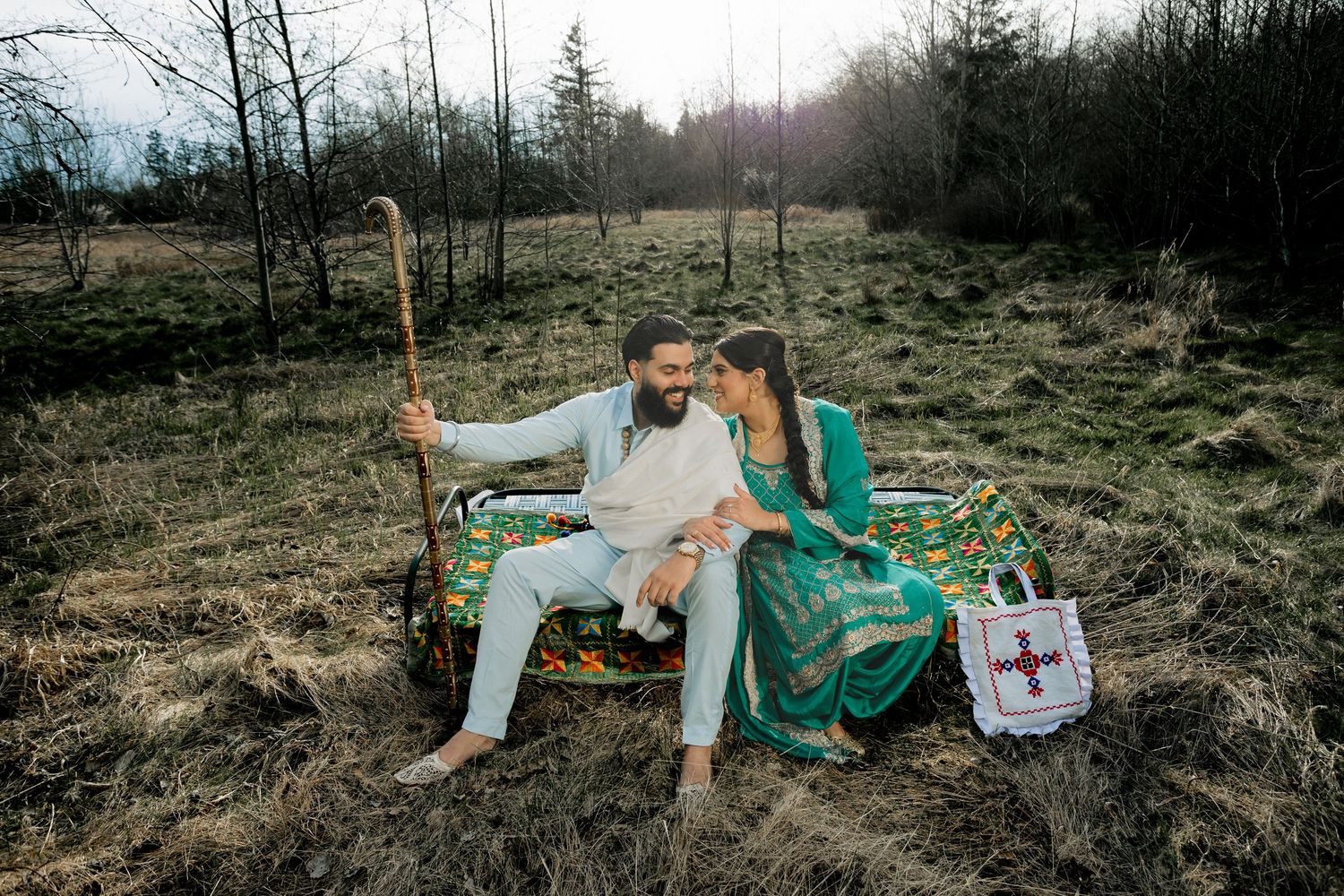 Vintage-inspired picnic setup in field with medical theme props and rustic decor.
