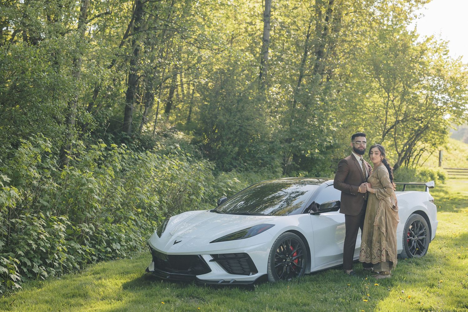 Multiple angles of a white sports car photographed in a lush green setting.