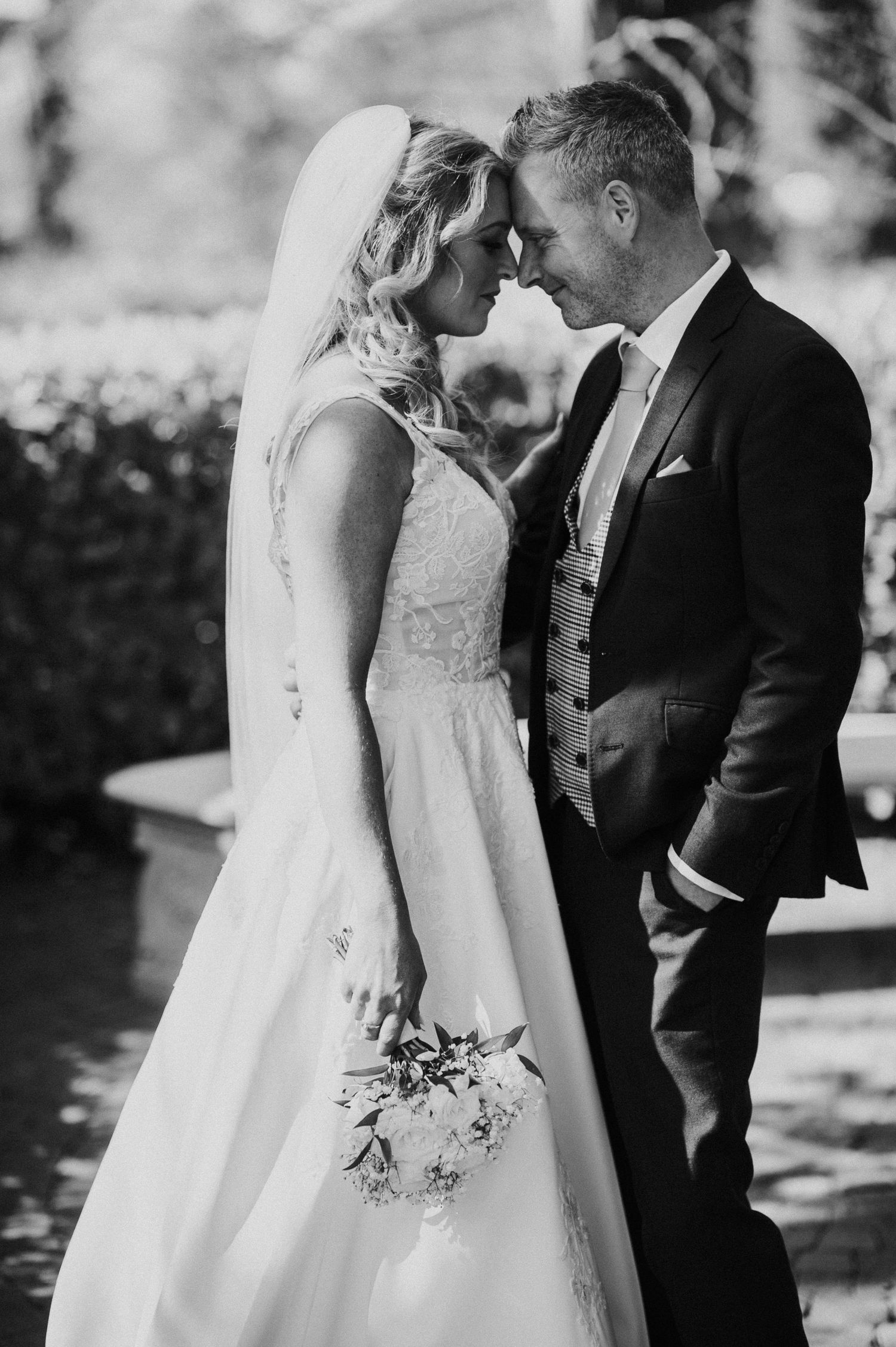 Black and white series of intimate wedding couple portraits.