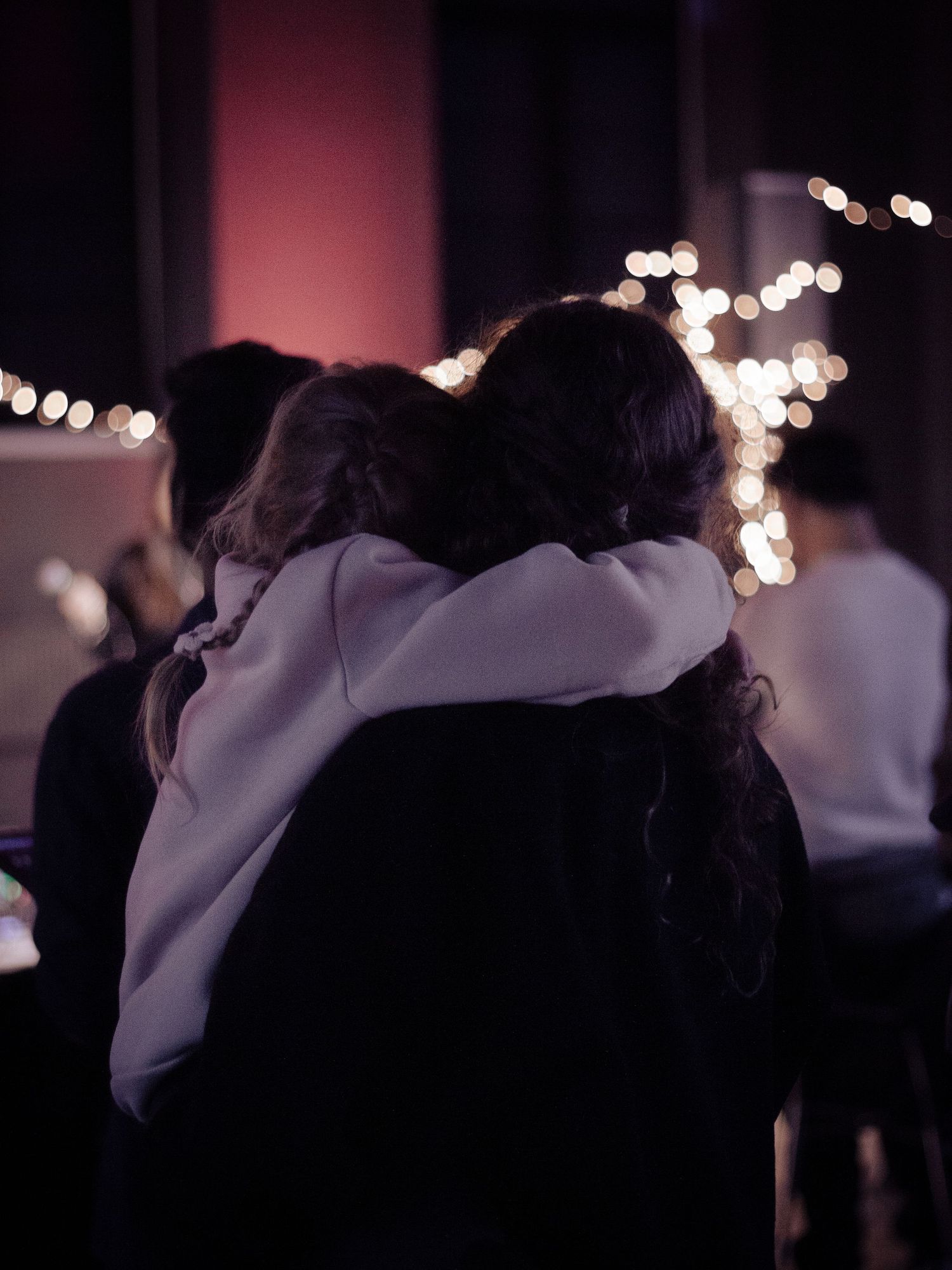 Mother and daughter hugging